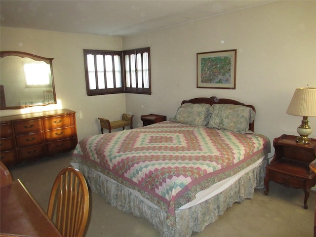 bedroom featuring carpet