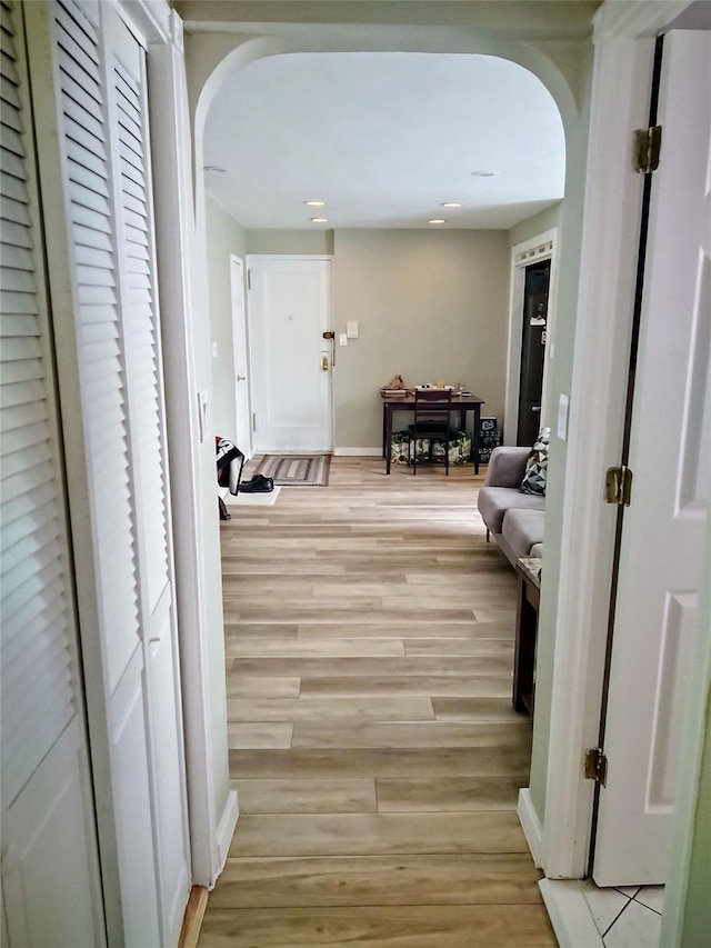 hall featuring light hardwood / wood-style floors