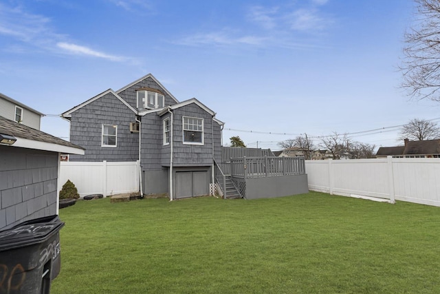 view of yard featuring a wooden deck