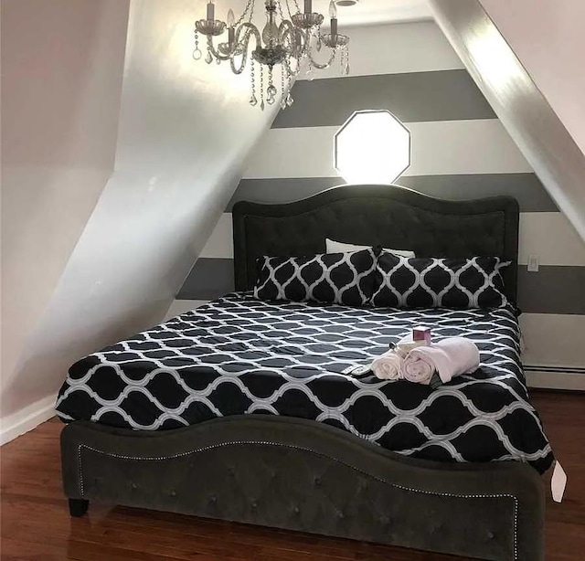 bedroom with vaulted ceiling, dark hardwood / wood-style floors, and a chandelier