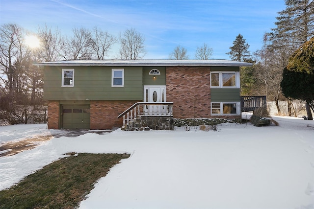 split foyer home featuring a garage