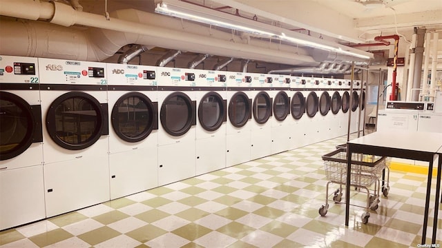 laundry room with washing machine and clothes dryer