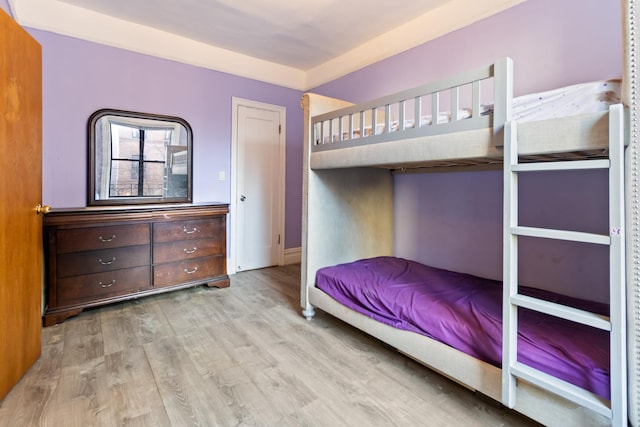 bedroom with light hardwood / wood-style floors