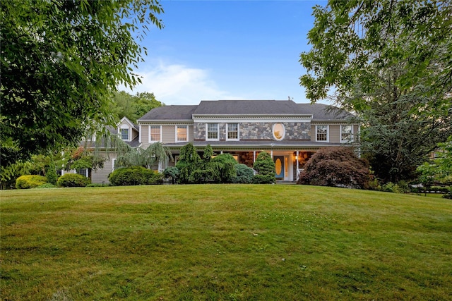 view of front of house with a front yard