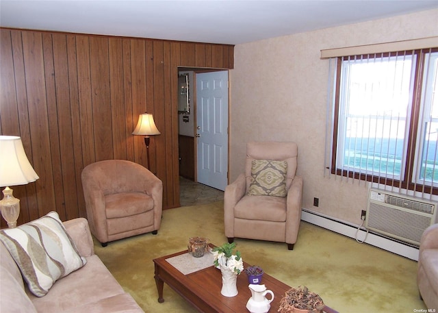 living room with a water view, light carpet, wooden walls, and a baseboard radiator