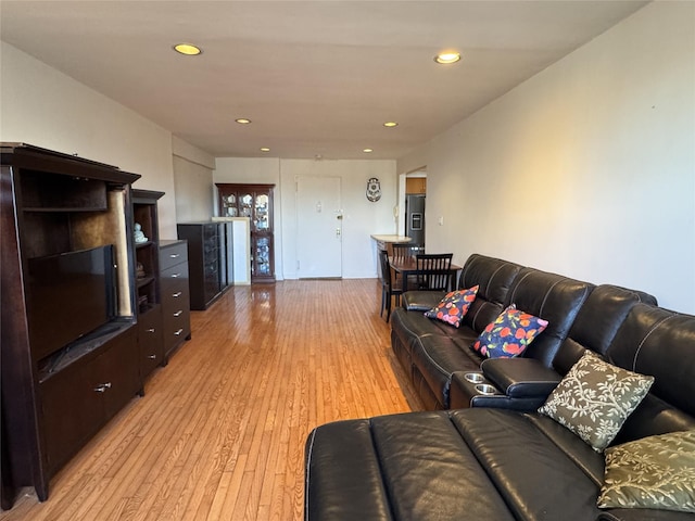 living room with light hardwood / wood-style floors