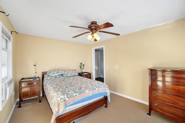 carpeted bedroom with cooling unit and ceiling fan