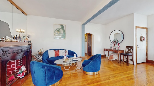 living area with hardwood / wood-style flooring