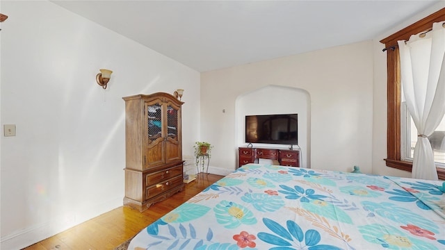 bedroom featuring hardwood / wood-style flooring