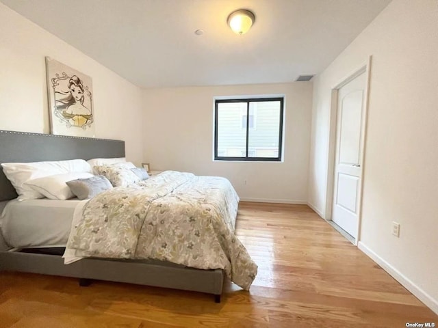 bedroom featuring light hardwood / wood-style floors