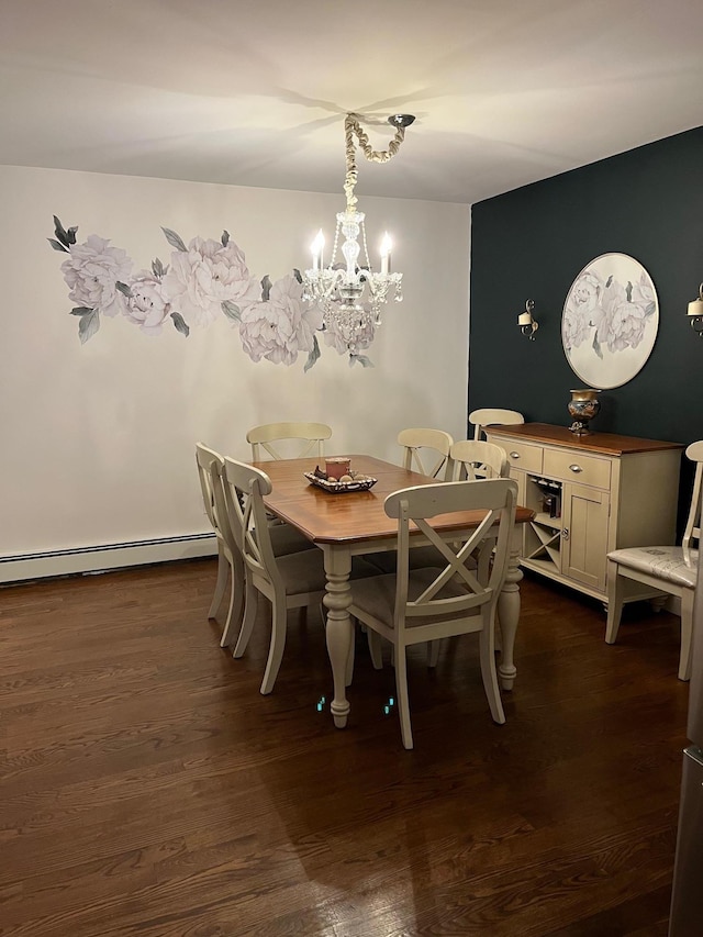 dining room featuring a chandelier, baseboard heating, and dark wood-type flooring