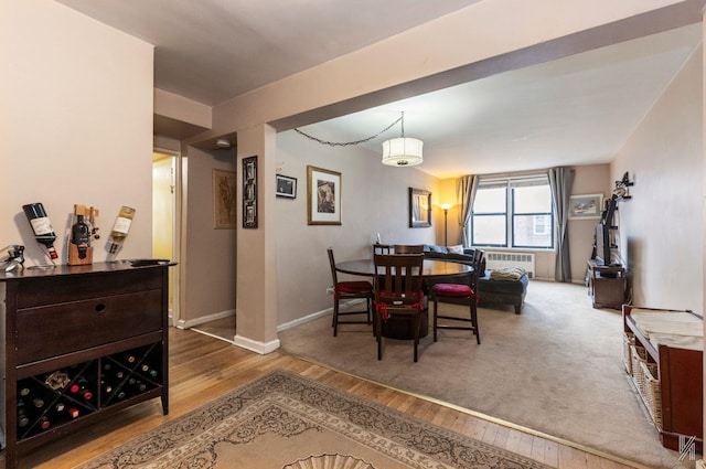 dining area featuring hardwood / wood-style floors