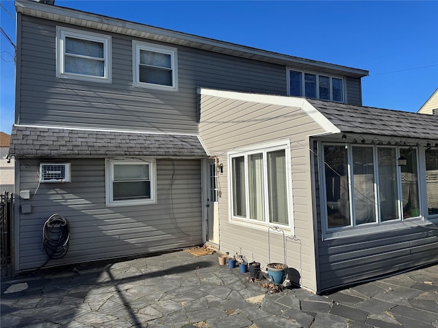 back of house featuring a patio