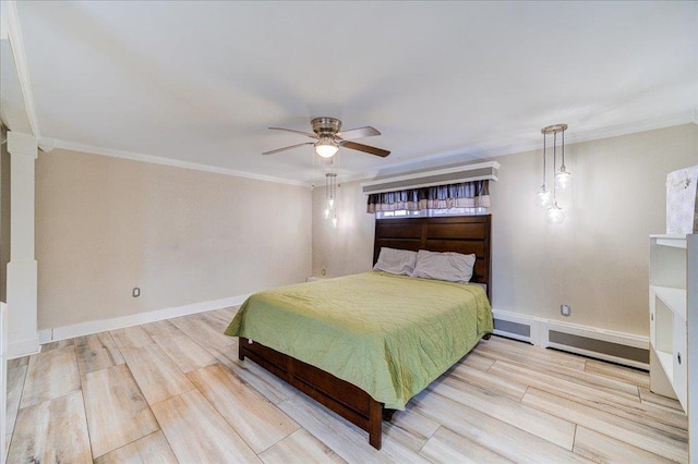 bedroom featuring ceiling fan, ornamental molding, and light hardwood / wood-style floors