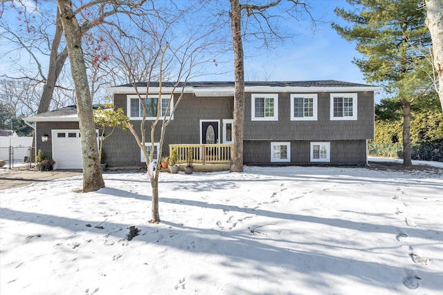 split foyer home featuring a garage