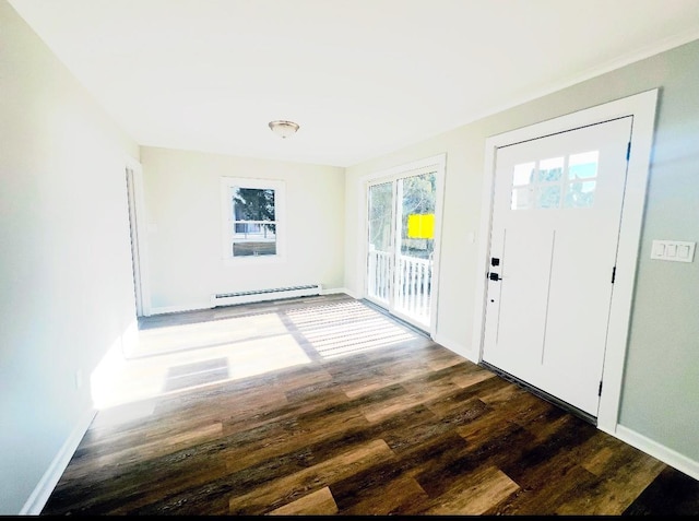 entryway featuring baseboard heating and dark hardwood / wood-style floors