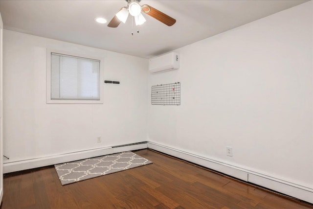 unfurnished room featuring ceiling fan, baseboard heating, dark hardwood / wood-style floors, and a wall mounted air conditioner