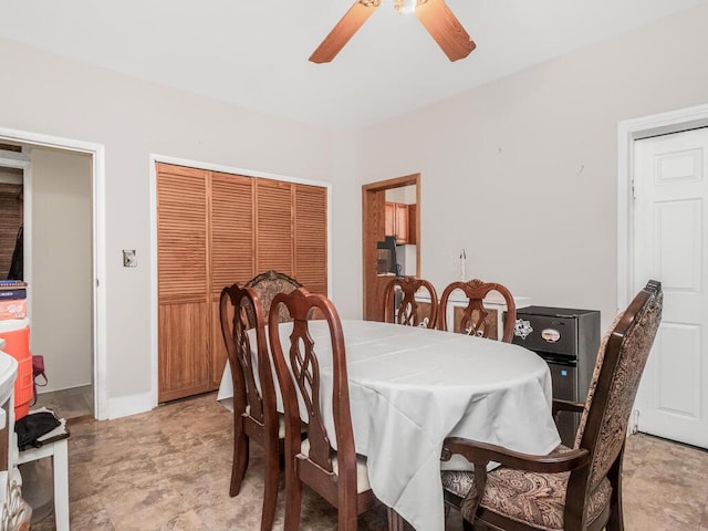 dining area with ceiling fan