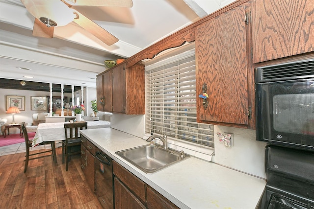 kitchen with decorative backsplash, sink, black dishwasher, and dark hardwood / wood-style flooring