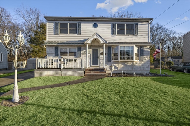 view of front of home with a front lawn