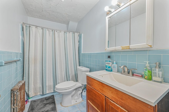 bathroom with toilet, vanity, tile patterned flooring, walk in shower, and a textured ceiling