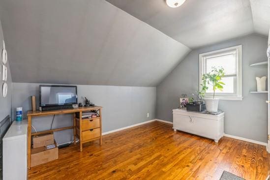 office area featuring hardwood / wood-style flooring and lofted ceiling