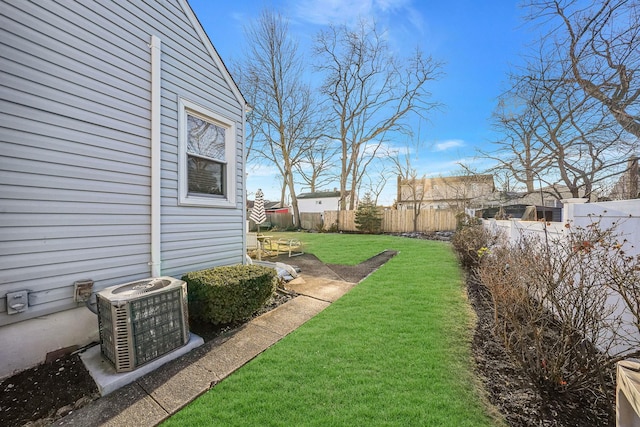 view of yard with central AC