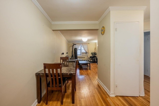 corridor featuring crown molding and wood-type flooring