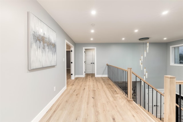 hallway with light wood-type flooring