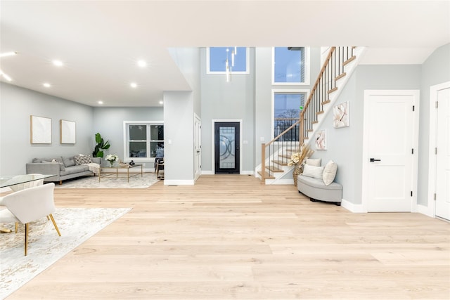 foyer with light hardwood / wood-style floors