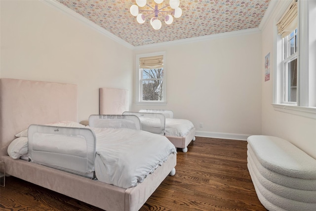 bedroom with dark hardwood / wood-style flooring, crown molding, and a notable chandelier