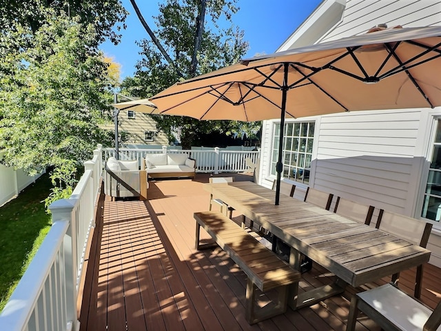 wooden deck with outdoor lounge area