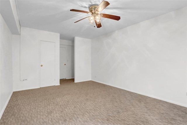 unfurnished bedroom featuring carpet and ceiling fan