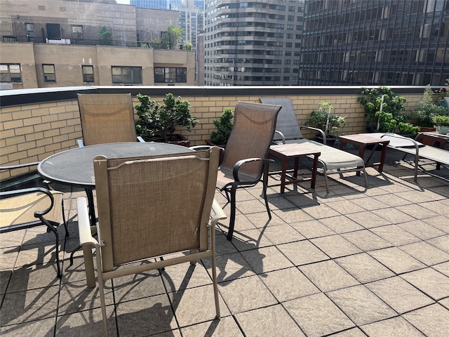 view of patio / terrace with a balcony