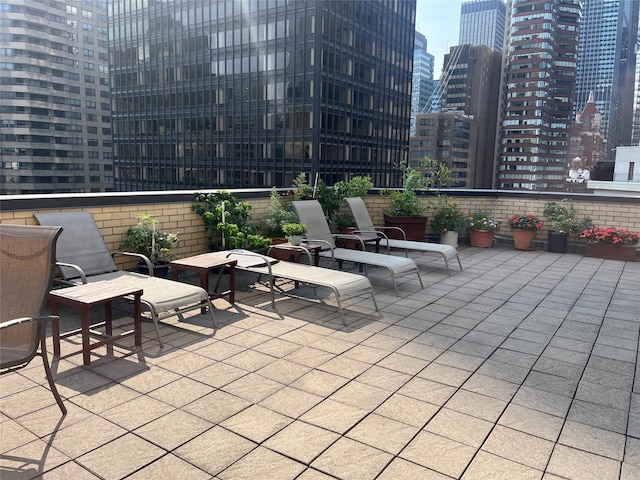 view of patio / terrace with a balcony