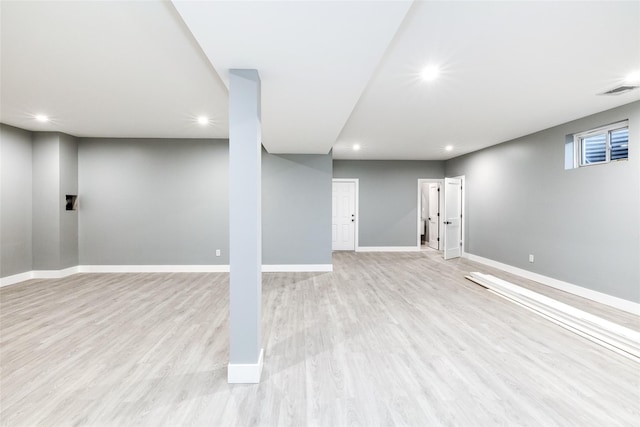 basement with light wood-type flooring