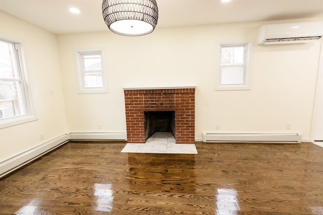 unfurnished living room with a healthy amount of sunlight, baseboard heating, an AC wall unit, and a brick fireplace