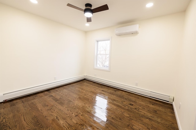 unfurnished room featuring a baseboard heating unit, ceiling fan, dark hardwood / wood-style flooring, and an AC wall unit