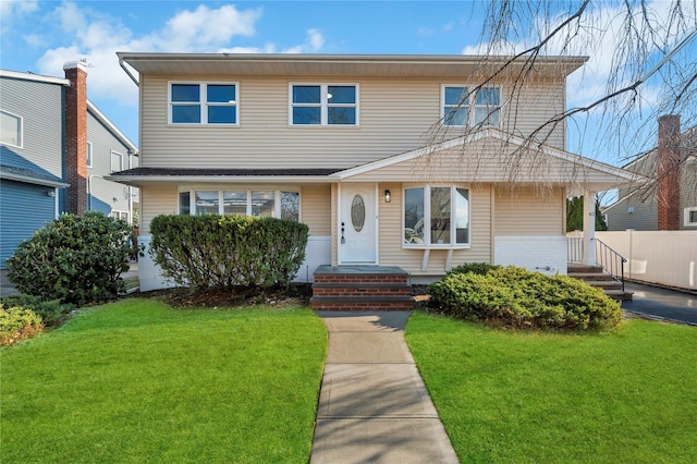 view of front of property with a front yard