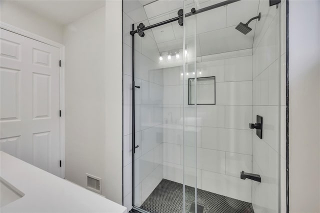 bathroom featuring walk in shower