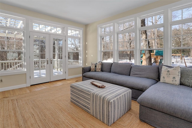 sunroom featuring french doors