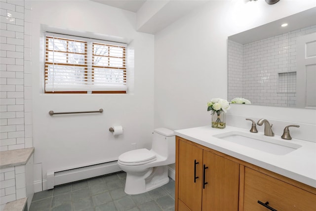 bathroom featuring a baseboard heating unit, vanity, a tile shower, tile patterned floors, and toilet