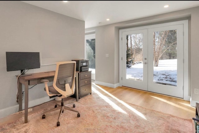 office area featuring light hardwood / wood-style flooring and french doors