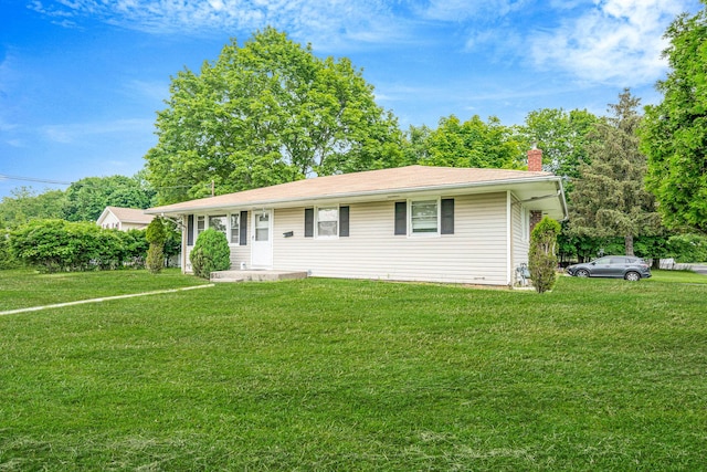 3 Radburn Ln, Port Jefferson Station, NY 11776 - ranch-style home with a front yard and a chimney