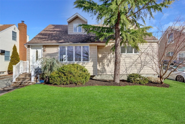 view of front of home featuring a front lawn