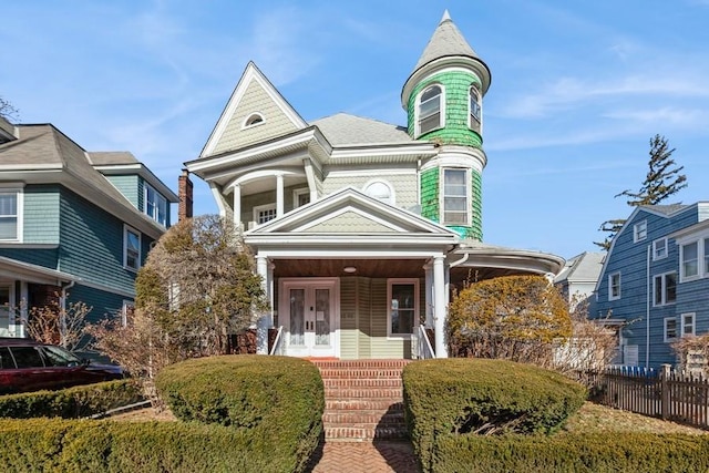 victorian home featuring a porch