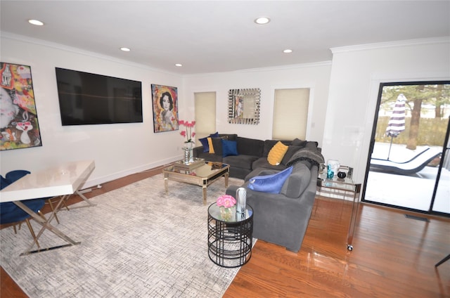 living room featuring crown molding and dark hardwood / wood-style flooring