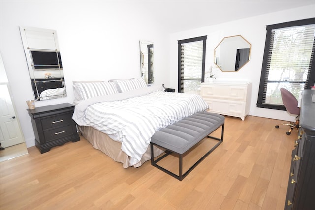 bedroom with light hardwood / wood-style floors