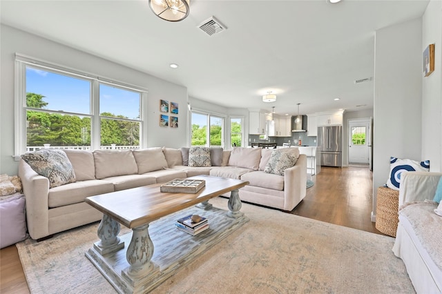 living room with hardwood / wood-style floors