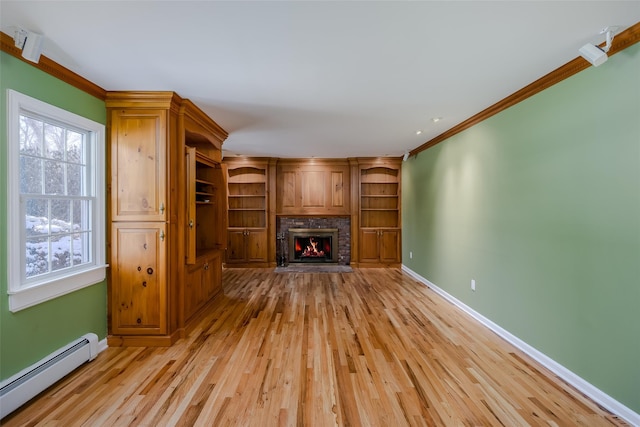 unfurnished living room with crown molding, a baseboard radiator, a brick fireplace, and light hardwood / wood-style flooring